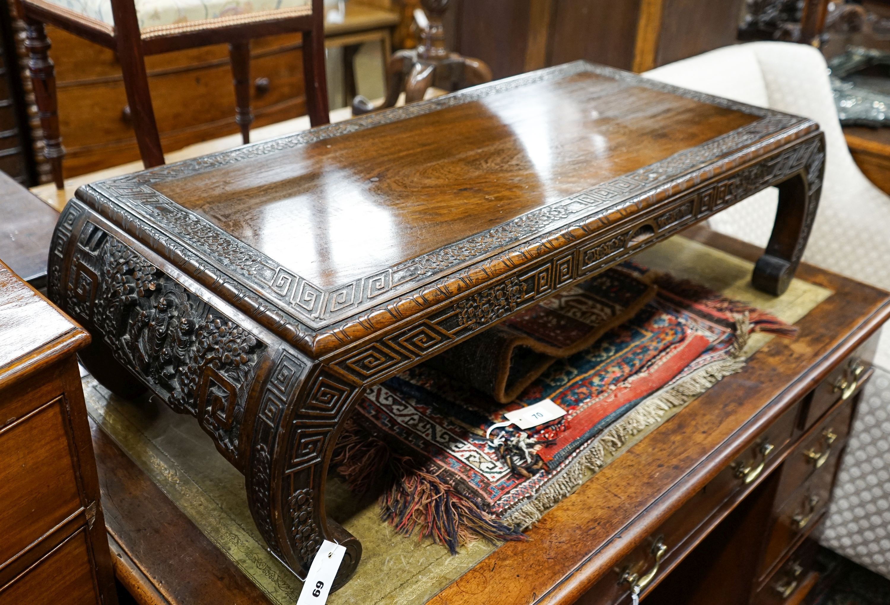 A Chinese rectangular carved top hardwood table, width 104cm, depth 46cm, height 29cm